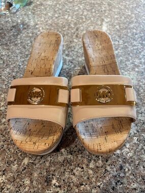 Michael Kors Warren Nude Leather Cork Wedge Slide Sandals with Gold MK Medallion